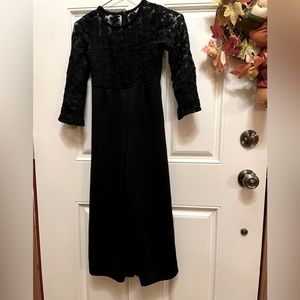 Girls Black Jumpsuit fits 8 Year Olds.Stretchy floral black on top half by SHEIN